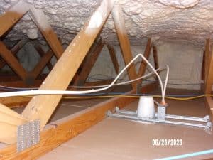 Unsecured Wires In Attic